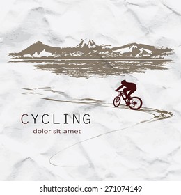 Cyclist on the background of crumpled paper