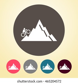 Cyclist on Hill Icon in round shape.