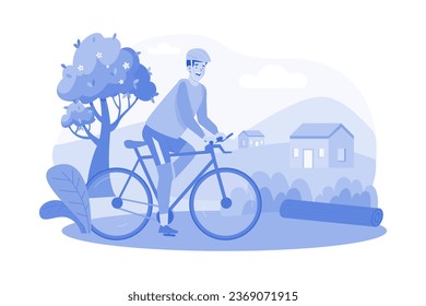 A cyclist rides in the countryside in the morning.