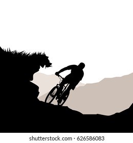 cyclist riding down hill