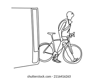 cyclist riding a train with a bike moves the bike forward with his hand