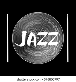 Cymbal or hi-hat with the word "jazz" and drumsticks on a black background.
