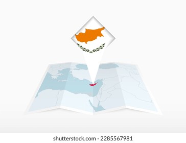 Cyprus is depicted on a folded paper map and pinned location marker with flag of Cyprus. Folded vector map.