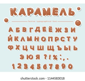Cyrillic caramel alphabet. Paper cut out sweet letters and numbers.