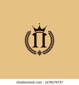 Cyrillic P, Latin N framed by a wreath with an element of ornament, crowned by a crown