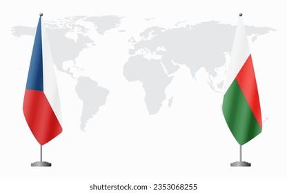 Czech Republic and Madagascar flags for official meeting against background of world map.