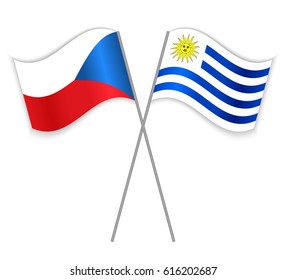Czech and Uruguayan crossed flags. Czech Republic combined with Uruguay isolated on white. Language learning, international business or travel concept.