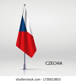 Bandera de Checia colgando en el asta de bandera