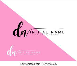 D N Initial handwriting logo vector. Hand lettering for designs.