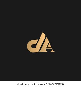 DA logo vector. Golden initial logo on black background.