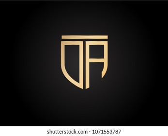 DA shield shape Letter Design in gold color