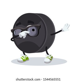 Dabbing cartoon black rubber hockey puck mascot on white background