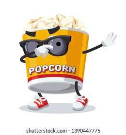 Dabbing cartoon filled yellow popcorn bucket mascot on white background