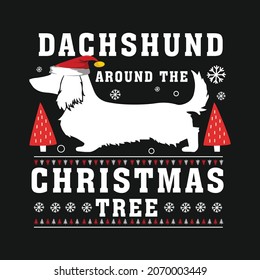 Dachshund around the christmas tree