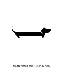 Dachshund dog icon. Black flat vector illustration. Cute funny pet symbol. Creative animal logo. Canine breed. 