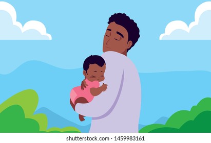 dad carrying his baby in his arms