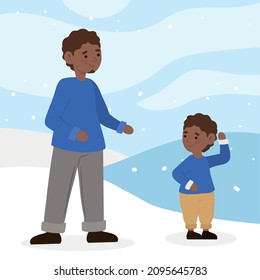 dad and son in snow winter landscape