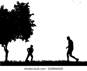 Daddy and son playing football in park, one in the series of similar images silhouette