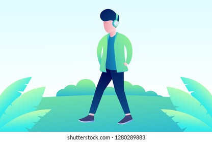 daily activity a man walking around the park in the natural background and listening a music
