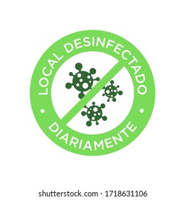 Daily disinfected premises icon written in Spanish. Coronavirus free round symbol.