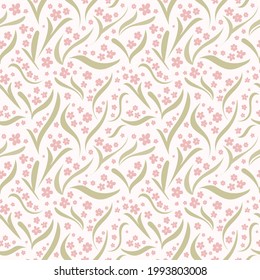 Dainty floral seamless vector pattern. Vintage style design with green leaves and light pink flowers on a pale background. Hand drawn illustration with flowing elements. Repeat wallpaper texture print