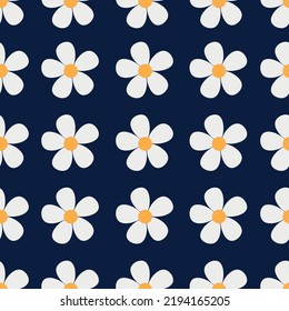Daisies. Seamless pattern with the image of daisies. Floral pattern with white flowers on a blue background. Vector illustration