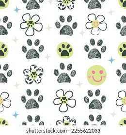 Daisies, smile faces, paw prints seamless fabric pattern