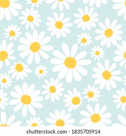 Daisy flower seamless pattern on blue background vector illustration.