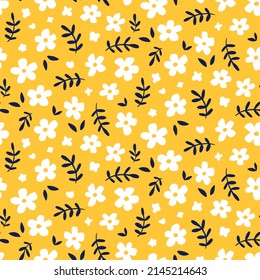 Daisy flower vector seamless pattern.  Hand drawn trendy floral background illustration. Ditsy flowers on yellow. Wallpaper, textile, wrapping paper. Blooming midsummer meadow