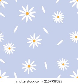 Daisy flowers. Vector illustration. Seamless print. Buds and petals of chamomile on light purple backdrop