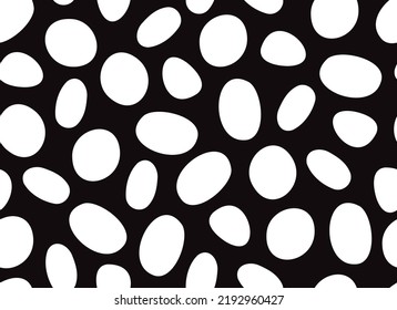 Dalmatian black seamless pattern. White uneven spots animal print. Abstract background with White circles. Vector background. Vector illustration. 