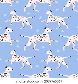 Dalmatian dog seamless pattern on blue background