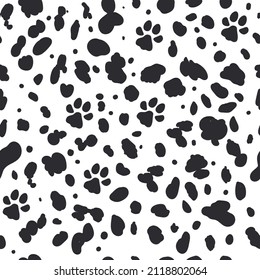 Dalmatian seamless pattern. Animal skin print. Dogs black dots and paw on white background. Vector