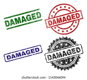DAMAGED seal prints with damaged surface. Black, green,red,blue vector rubber prints of DAMAGED label with scratched texture. Rubber seals with round, rectangle, rosette shapes.