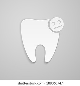 Damaged tooth on gray background