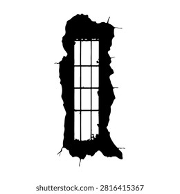 A damaged window frame with cracked glass set in a deteriorated wall, highlighting neglect and decay in an abandoned building interior.