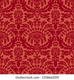 Damascus. Bright seamless ornament. Modern classic Wallpaper, fabric. The color of the pattern is red and coral background