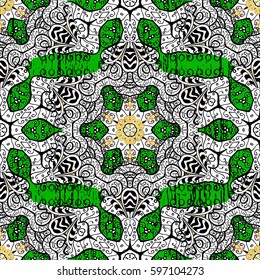 Damask pattern repeating background. Golden green floral ornament in baroque style. Antique golden repeatable wallpaper.Golden element on green background.