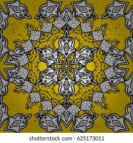 Damask pattern repeating background. Ornamental yellow floral ornament in baroque style. Antique ornamental repeatable wallpaper.Ornamental element on yellow background.