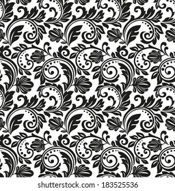Damask seamless floral pattern. Royal wallpaper. Flowers on a black background.