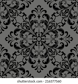 Damask seamless floral pattern. Royal wallpaper. Flowers on a black background.
