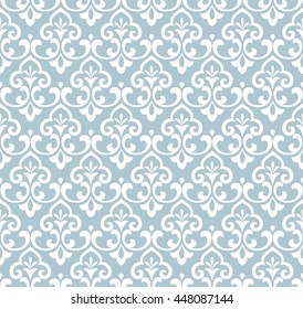 Damask seamless floral pattern. Royal wallpaper. Blue and white flowers on a transparent background. Stylish graphic pattern.