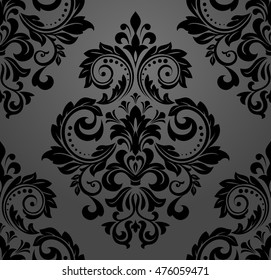 Damask seamless floral pattern. Royal wallpaper. Flowers on a black background. Luxurious vector ornament.