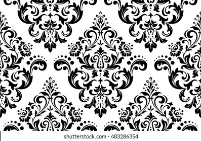 Damask seamless floral pattern. Royal wallpaper. Flowers on a black and white background. Graphic modern pattern.