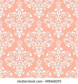 Damask seamless floral pattern. Royal wallpaper. Flowers on a pink background. Luxurious vector ornament. Graphic stylish pattern.