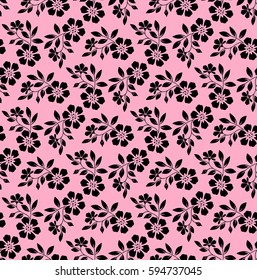 Damask seamless floral pattern. Royal wallpaper. Black flowers on a pink background. Graphic modern pattern.