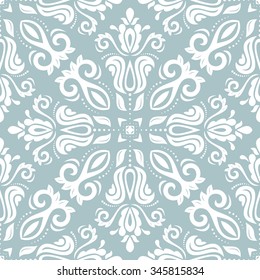 Damask seamless ornament. Traditional vector pattern. Classic oriental light blue and white background