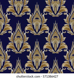 Damask  seamless pattern. Antique wallpaper with vintage medieval  flowers,  leaves and luxury gold floral  ornaments in Baroque style.. Vector royal texture. Dark blue  elegant  background.