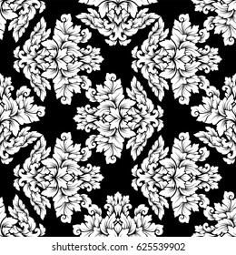 Damask seamless pattern intricate design. Luxury royal ornament, victorian texture for wallpapers, textile, wrapping. Exquisite floral baroque lacy flourish in black and white monochrome colors.