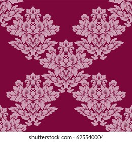 Damask seamless pattern intricate design. Luxury royal ornament, victorian texture for wallpapers, textile, wrapping. Exquisite floral baroque lacy flourish in vintage deep red color.
